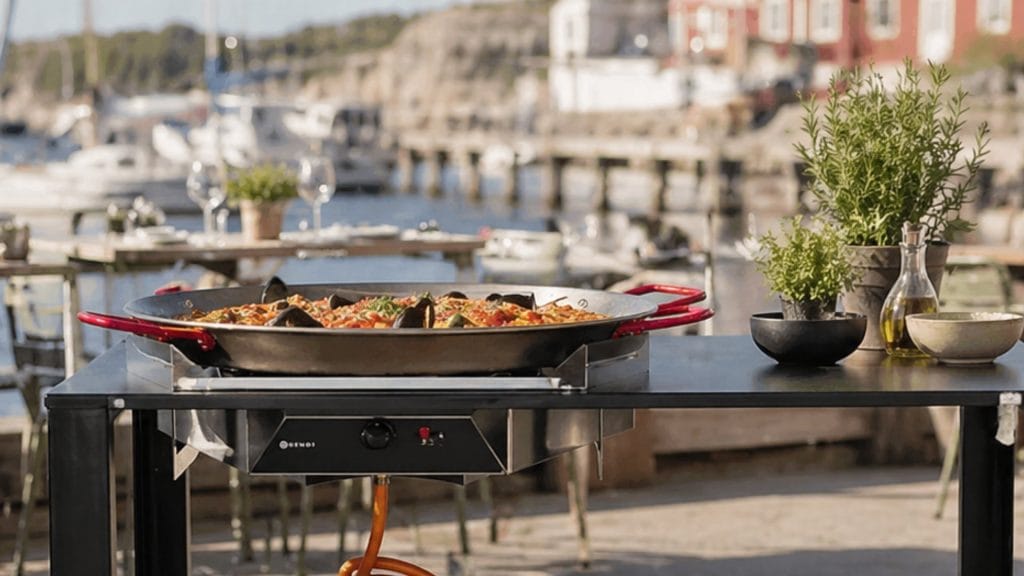 nærbilde av paellagrill ved bryggerestaurant